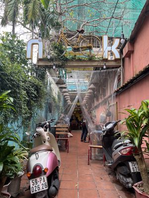 Entrance and outdoor seating   at Nook Eatery in Hue