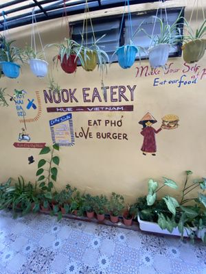 Cute little wall art  at Nook Eatery in Hue