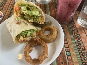 greek wrap, tofu/jackfruit bao, berry smoothie  at Nook Eatery in Hue