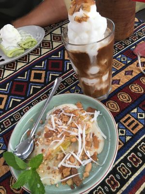 Coconut iced coffee and tapioca banana cake at Nook Eatery in Hue