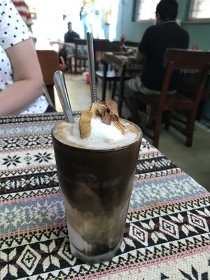 Coconut iced coffee (they put condensed milk in so be sure to ask for it without) at Nook Eatery in Hue