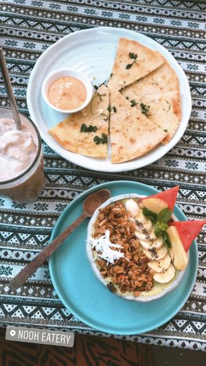 Smoothie bowl and garlic pita at Nook Eatery in Hue
