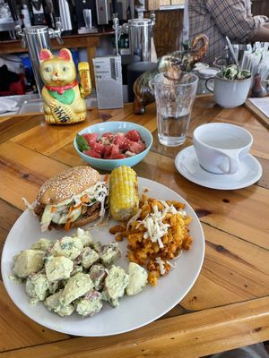 Bbq mushroom platter w watermelon salad, spicy Mac and chz and redskin dill potato salad   at Two Dollar Radio Headquarters in Columbus
