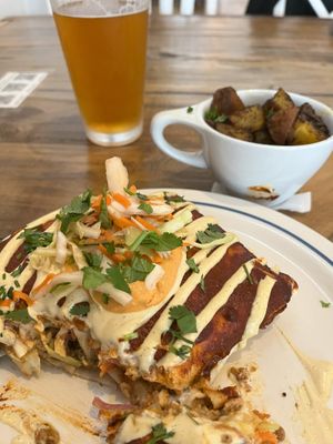 Tortuga and home fries with a draft beer at Two Dollar Radio Headquarters in Columbus