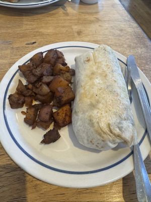 Vegan meat lovers burrito with home fries  at Two Dollar Radio Headquarters in Columbus