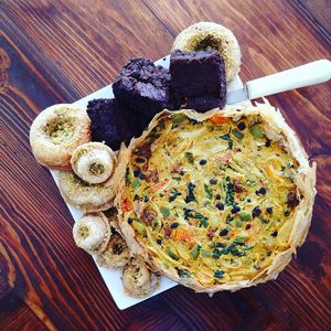 Some vegan offerings prepared by Freaks+Leeks - Baklava donut, thick brownies, quiche at Two Dollar Radio Headquarters in Columbus