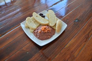 Red Curry Hummus — white beans + red curry = hummus goodness.
Served with sliced locally-made ciabatta at Two Dollar Radio Headquarters in Columbus