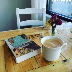 Two Dollar Radio Headquarters latte with nut milk. at Two Dollar Radio Headquarters in Columbus