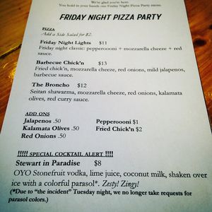 Friday Night (vegan) Pizza Party menu! (Changes every Friday) Featuring "Friday Night Lights", "Barbecue Chick'n" and "The Broncho"—Decked out with some but not all of the following at the same time: house-made cashew mozzarella cheeze, pepperoooni, red curry sauce, and fried chick'n.  at Two Dollar Radio Headquarters in Columbus