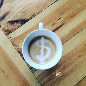 Latte art featuring $ (nut milks only) at Two Dollar Radio Headquarters in Columbus