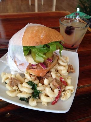 Notable Fried Chick'n Sammy: Fried chick'n, pimento cheeze, smoky superhero sauce, red onions, lettuce, pickles, on a ciabatta bun. (Contains cashews.) at Two Dollar Radio Headquarters in Columbus