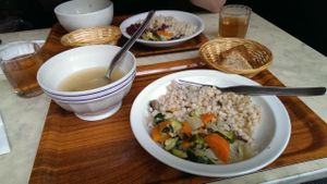 A daily menu: Spelt with vegetable, Soup and bread at Club Centro Macrobiotico in Milan