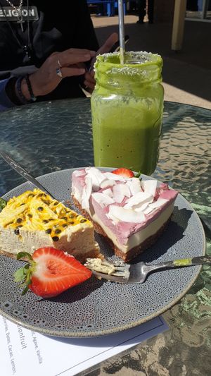 Passion fruit cheese cake, raspberry white chocolate cheese cake and  courage smoothie. at RAWR Bar in Apollo Bay