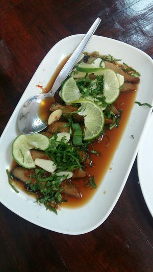 Mock fish in lemon and garlic sauce at Nop Nan in Bangkok