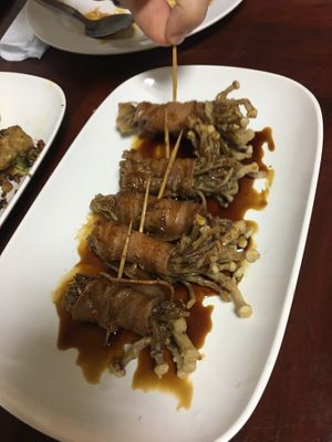 Bacon wrapped enoki  at Nop Nan in Bangkok
