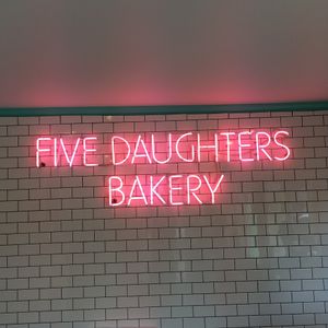 love this neon sign over the main area at Five Daughters Bakery - Caruthers Ave in Nashville
