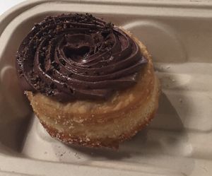 Vegan Donut: donut with chocolate glaze  at Five Daughters Bakery - Caruthers Ave in Nashville