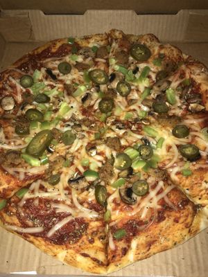 Vegan pizza with vegan sausage,violife mozzarella,mushroom,bellpepper jalapeño  at Trail Rider in Cedar Crest