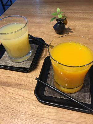 Apple juice and mandarin juice. at Cafe Guri in Kamakura