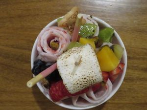 Coconut/ strawberry rolled ice cream with tropical fruit! at Momotaro in State College