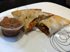 Baked Samosa with Spiced Apple Chutney at Detroit Street Filling Station in Ann Arbor