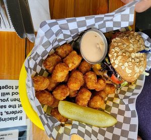 Del burger and tots with yum sauce at Detroit Street Filling Station in Ann Arbor