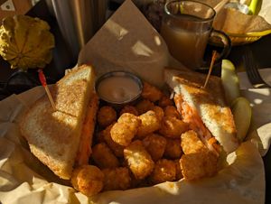 Bahn mi in exile sandwich with yum yum tots. So filling that I could barely eat the tots but I did my best! at Detroit Street Filling Station in Ann Arbor
