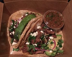 “Carnitas” tacos to-go at Detroit Street Filling Station in Ann Arbor