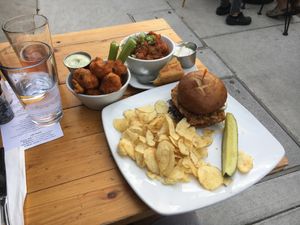 Buffalo cauliflower, fried chicken sandwich, and sweet potato chili  at Detroit Street Filling Station in Ann Arbor