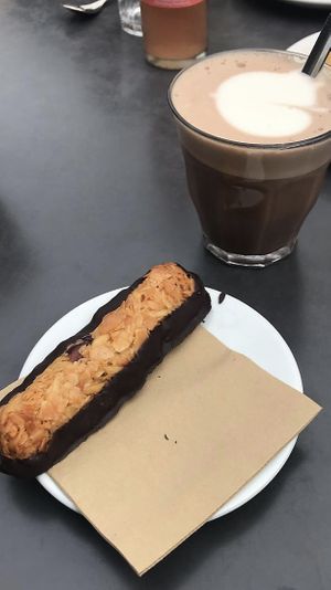 Dark chocolate Florentiner with hot chocolate and oat milk  at Kaffeerösterei in Sylt