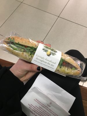 Tasty avocado pesto ciabatta with rocket salad and sundried tomatoes  at STN - Pret A Manger in Stansted