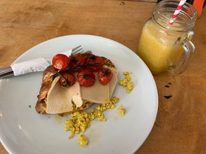 Savoury loaded croissant and Tropical Escape smoothie at Beetroot Sauvage in Edinburgh