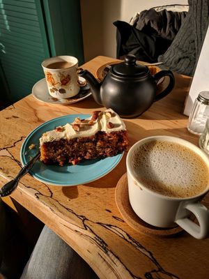 Carrot cake and an almond latte  at Shoe Tree Cafe in Newcastle Upon Tyne