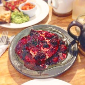 Pancake stack with berries  at Shoe Tree Cafe in Newcastle Upon Tyne