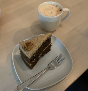 Coffee and walnut cake with chai latte at Essential Vegan @ Ten to One Bar in North London