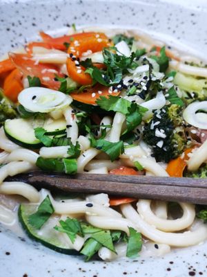 Udon noodles with vegetables and coconut sauce at Forrest Bistro in Prague