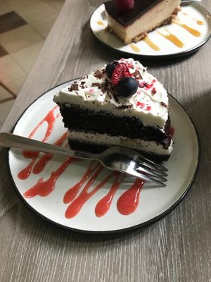 Chocolate cake with creme and peanut butter cheesecake at Forrest Bistro in Prague