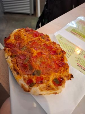 Pizza slice at Vegan Bombon in Alicante