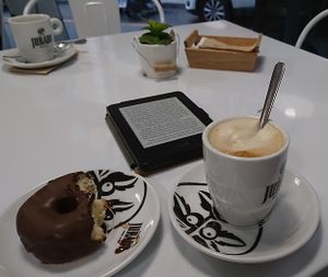 Coffee and a doughnut at Vegan Bombon in Alicante