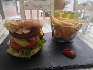 Beyond meat burger with fries at Amelie Green in Gran Canaria