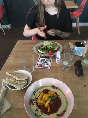 Shakshuka with hummus and pita & avo toast with hummus at Mana - Schöneberg in Berlin
