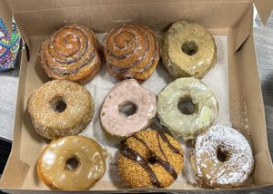 Vegan donuts including maple, cinnamon roll, cinnamon sugar, fresh strawberry, lemon poppy   at Sugar Shack Donuts & Coffee in Richmond