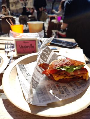 Bacon burger and vegan mozzarella at Bite Me Cafe in Madrid
