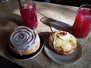 Cinnamon roll, apple toffee doughnut, pink lemonade at Bite Me Cafe in Madrid