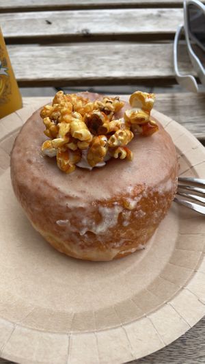 Caramel popcorn donut with whipped cream  at Bite Me Cafe in Madrid
