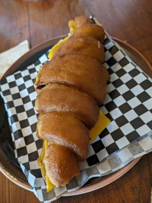 Ham and cheese vegan croissant at Bite Me Cafe in Madrid