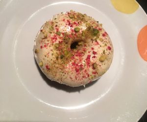 White chocolate and pistachio donut at Bite Me Cafe in Madrid