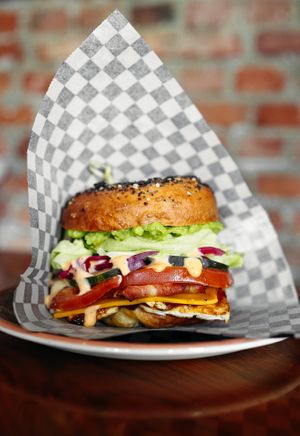 Breakfast Bagel, our messiest sandwich at Bite Me Cafe in Madrid