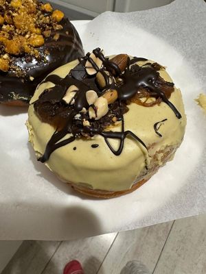 Pistachio snickers donut at Bite Me Cafe in Madrid