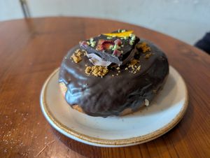 Pistachio and chocolate donut at Bite Me Cafe in Madrid